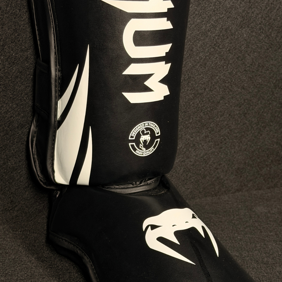 Espinilleras de Muay Thai/MMA Venum Challenger